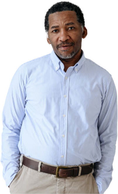 photo of pensive-looking man with hands in pockets